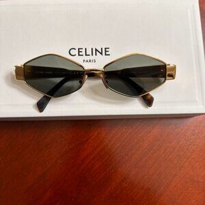CELINE triomphe hexagon-frame gold tone sunglasses.